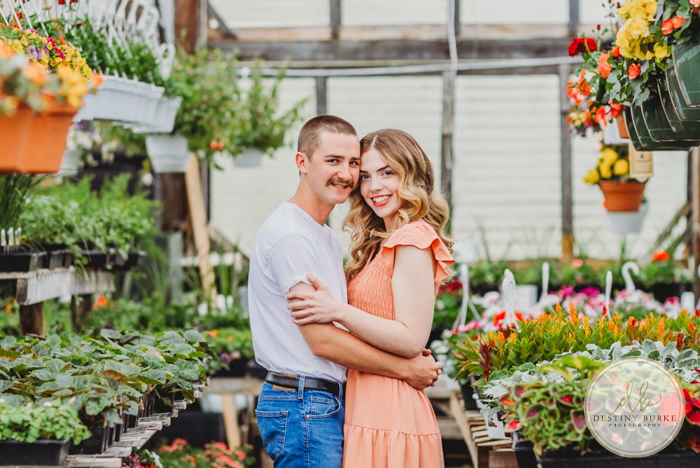 best engagement photographer near rochester ny couples session greenhouse flowers caledonia