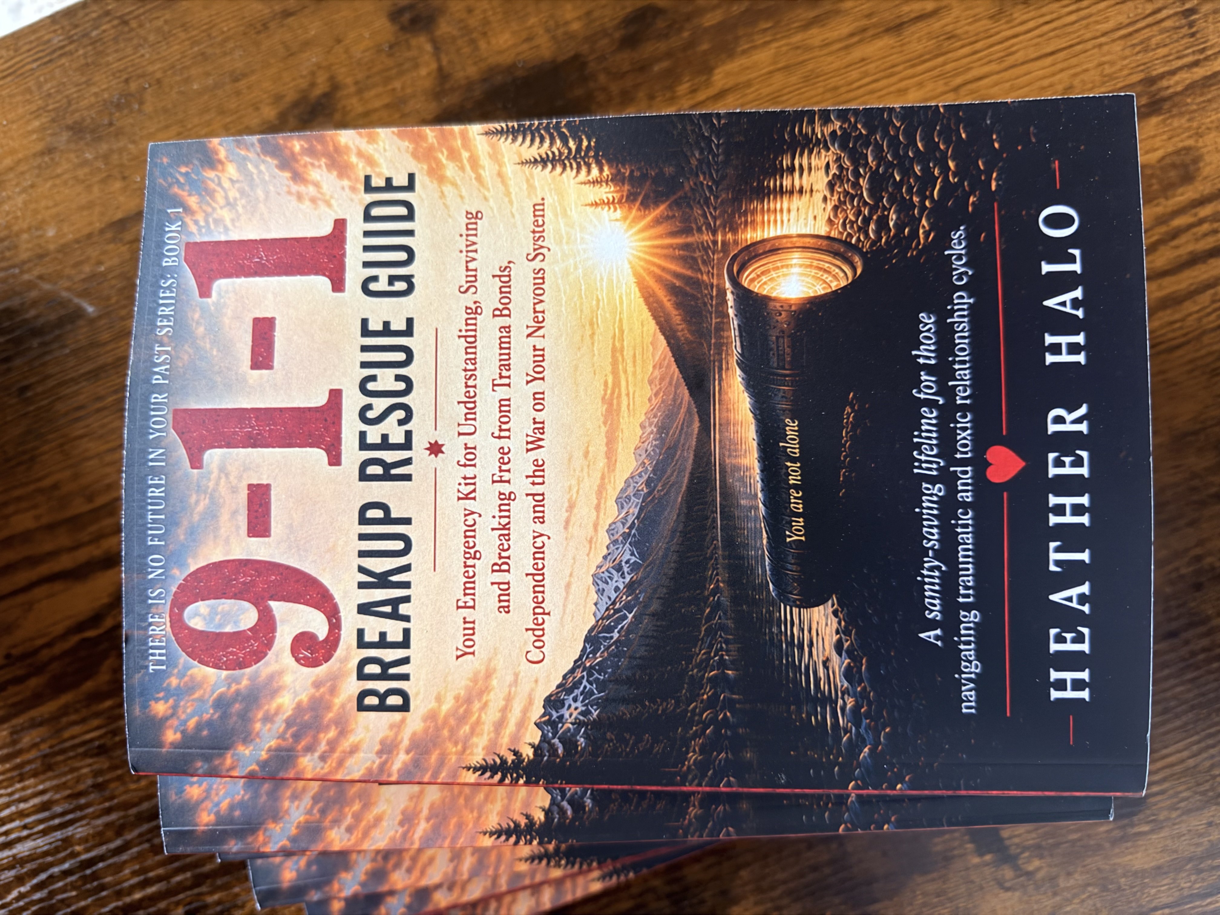 Copies of the 9-1-1 Breakup Rescue Guide by Heather Halo